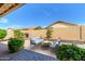 Inviting backyard with a cozy fire pit area and comfortable seating, perfect for outdoor entertaining at 17958 W Udall Dr, Surprise, AZ 85374