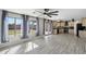 Bright and open living space featuring a seamless transition to the kitchen with lots of natural light at 1887 W Desert Seasons Dr, Queen Creek, AZ 85144