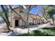 Charming townhome showcasing a two-story facade, complemented by mature trees and well-maintained landscaping at 1961 N Hartford St # 1162, Chandler, AZ 85225