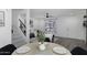 Open-concept living room with modern furnishings, bright lighting, and stylish decor at 1961 N Hartford St # 1162, Chandler, AZ 85225