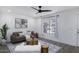 Cozy living room featuring a modern sofa, stylish coffee table, and ample natural light at 1961 N Hartford St # 1162, Chandler, AZ 85225