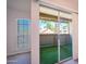 View from covered balcony to neighborhood homes and greenery at 200 E Southern Ave # 222, Tempe, AZ 85282