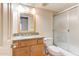 Bathroom features a shower and tub, wooden vanity, and granite countertop at 200 E Southern Ave # 222, Tempe, AZ 85282