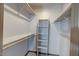 Walk-in closet featuring built in shelves and ample storage space at 200 E Southern Ave # 222, Tempe, AZ 85282