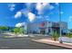 Exterior shot of Tempe Eats restaurant with a gray facade and ample parking under a bright sky at 200 E Southern Ave # 222, Tempe, AZ 85282