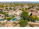 Stunning aerial view featuring a private pool, lush backyard, and desert landscaping in a beautiful neighborhood setting at 22406 N 36Th Way, Phoenix, AZ 85050