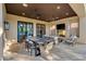 Covered patio with outdoor dining and lounge area offers a perfect spot for year-round enjoyment at 22406 N 36Th Way, Phoenix, AZ 85050