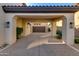 Spacious driveway and porte-cochère leading to a garage and backyard at 22406 N 36Th Way, Phoenix, AZ 85050