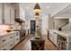 Bright kitchen featuring a large island and stainless steel appliances at 22406 N 36Th Way, Phoenix, AZ 85050