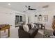Bright living room featuring a comfortable sofa and a foosball table at 22406 N 36Th Way, Phoenix, AZ 85050