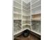 Organized pantry featuring pull out shelves and maximizing corner space at 22406 N 36Th Way, Phoenix, AZ 85050