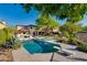 Luxury pool and spa offer a refreshing escape with a diving board and ample lounge space at 22406 N 36Th Way, Phoenix, AZ 85050