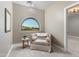 Comfortable sitting area with an arched window and neutral décor at 22406 N 36Th Way, Phoenix, AZ 85050