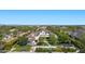 Overhead shot showcases backyard featuring a pool, trampoline, seating and desert views in the distance at 23902 S 202Nd Ct, Queen Creek, AZ 85142