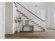 Inviting foyer with a staircase, hardwood floors, and decorative accents at 23902 S 202Nd Ct, Queen Creek, AZ 85142