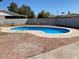 This backyard features a refreshing pool surrounded by a brick-paved patio at 2902 W Bloomfield Rd, Phoenix, AZ 85029