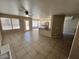 Open concept living area flows into kitchen with granite countertops and modern appliances at 31203 N 43Rd St, Cave Creek, AZ 85331