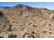 Aerial shot showcasing vacant land ready for development, surrounded by natural desert beauty at 3367 N Highlands Dr # 39, Buckeye, AZ 85396