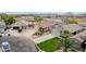 Inviting home with landscaped yard, long driveway and multi-car garage in suburban neighborhood at 36064 N Murray Grey Dr, San Tan Valley, AZ 85143
