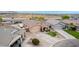 View of property showing multi-car garage, large yard, and outdoor structure for storage at 36064 N Murray Grey Dr, San Tan Valley, AZ 85143