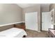Bedroom featuring a small twin-sized bed and a closet at 36064 N Murray Grey Dr, San Tan Valley, AZ 85143