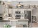 Bright eat-in kitchen featuring stainless appliances and tile flooring at 36064 N Murray Grey Dr, San Tan Valley, AZ 85143