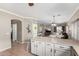 Bright kitchen with an adjacent living room at 36064 N Murray Grey Dr, San Tan Valley, AZ 85143