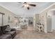 Inviting living room with neutral tones, open layout, and seamless transition to the kitchen at 36064 N Murray Grey Dr, San Tan Valley, AZ 85143