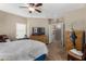 Relaxing main bedroom with neutral walls, ceiling fan, and carpeted floors at 36064 N Murray Grey Dr, San Tan Valley, AZ 85143
