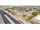 A street view of homes in the neighborhood, showcasing the community's well-maintained landscaping and convenient location at 36064 N Murray Grey Dr, San Tan Valley, AZ 85143