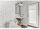 Stylish bathroom featuring a black cast iron sink, subway tile, and modern fixtures at 3616 N 54Th Pl, Phoenix, AZ 85018