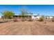 Single-story home featuring mature trees and desert landscaping at 3747 S Mammoth Dr, Casa Grande, AZ 85193