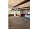 View of living room featuring wood beams and a built-in cabinet at 3747 S Mammoth Dr, Casa Grande, AZ 85193