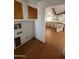 A utility room with brown flooring at 3747 S Mammoth Dr, Casa Grande, AZ 85193