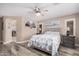 Relaxing bedroom with ceiling fan, comfortable queen bed and nautical décor at 4262 E Sundance Ave, Gilbert, AZ 85297