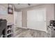 Neutral bedroom with closet, overhead lighting, and wood-look floors at 4262 E Sundance Ave, Gilbert, AZ 85297