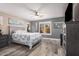 Spacious main bedroom with stylish decor, a ceiling fan, and plenty of natural light at 4262 E Sundance Ave, Gilbert, AZ 85297