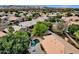 Aerial view of a backyard with a pool, patio, gazebo, and lush landscaping, surrounded by a residential neighborhood at 4616 E Gold Poppy Way, Phoenix, AZ 85044