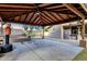 Covered patio with ceiling fan and outdoor living space, perfect for relaxing and entertaining outdoors at 4616 E Gold Poppy Way, Phoenix, AZ 85044
