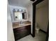 Elegant bathroom with granite vanity, modern sink, and stylish lighting, offering a relaxing and functional space at 4830 N 72Nd Way, Scottsdale, AZ 85251