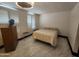 Bedroom with marble floors, plentiful natural light, a ceiling fan and neutral paint at 4830 N 72Nd Way, Scottsdale, AZ 85251