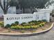 A colorful flower garden in front of the Royale Gardens community welcome sign at 4830 N 72Nd Way, Scottsdale, AZ 85251