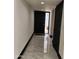 Bright entryway features sleek marble flooring and a modern front door with glass panes, creating an inviting entrance at 4830 N 72Nd Way, Scottsdale, AZ 85251