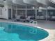 Poolside view with chaise lounges and a view of the recreation area at 4830 N 72Nd Way, Scottsdale, AZ 85251