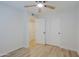 Comfortable bedroom featuring neutral paint, a ceiling fan, and closet for efficient storage at 5627 W Comet Ave, Glendale, AZ 85302