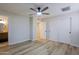 Comfortable bedroom featuring neutral paint, a ceiling fan, and closet for efficient storage at 5627 W Comet Ave, Glendale, AZ 85302