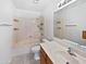 Bathroom with bathtub and shower, toilet, vanity and mirror at 5976 W Alameda Rd, Glendale, AZ 85310