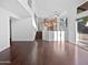 Open-concept living space showcasing hardwood floors, high ceilings, and ample natural light at 5976 W Alameda Rd, Glendale, AZ 85310