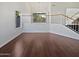 Second floor loft with hardwood floors, white walls, and lots of natural light at 5976 W Alameda Rd, Glendale, AZ 85310