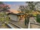 Expansive backyard with desert landscaping and a covered patio, perfect for outdoor living at 6002 E Cholla Rd, Cave Creek, AZ 85331